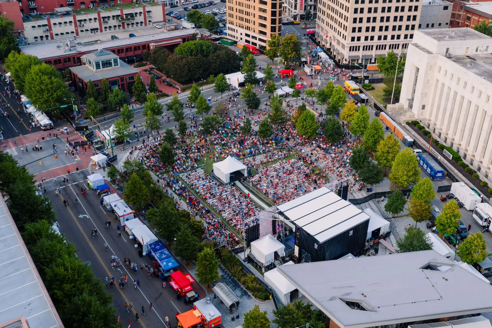 Outdoor event coverage from above, festival grounds