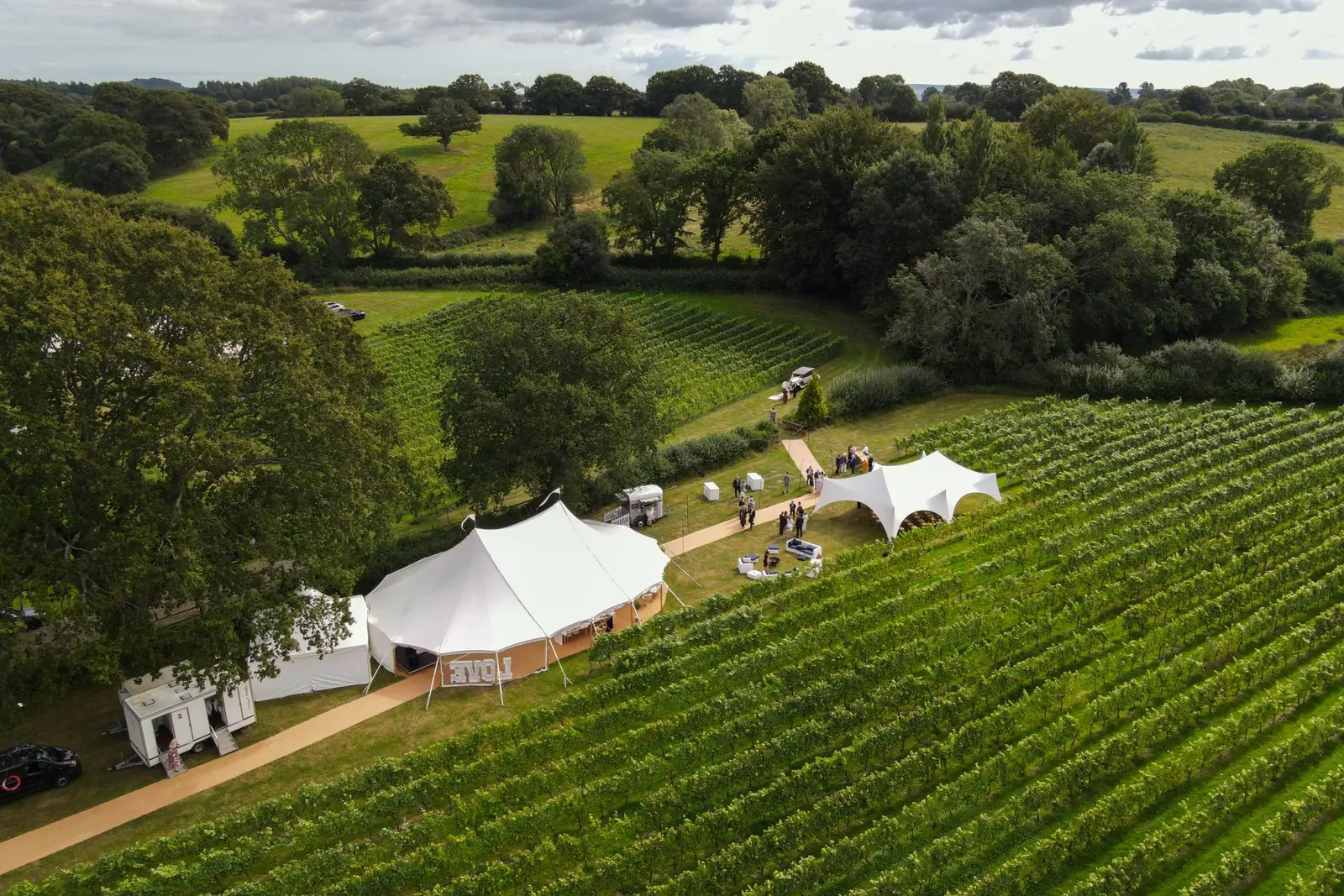 Reception tent and venue gardens at blue hour